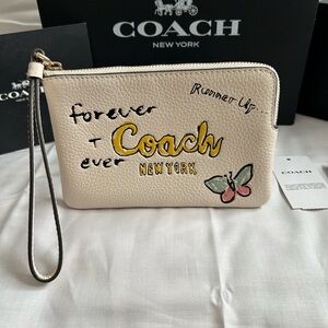 Coach Cream Leather Wristlet with Yellow Logo & Pink Green Butterfly
Chalk Sktch